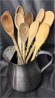 Pitcher with wooden kitchen spoons