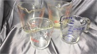 4 fire king and Pyrex measuring cups