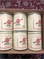Box full of meadow gold ice cream tins