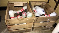 Two wooden crates with bowling pins and more