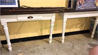Pair of two Legs console tables that came from