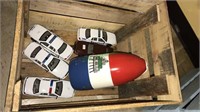 Wood crate with five die cast police cars and a
