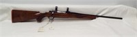 Ruger M77 .280 Rem bolt action rifle with scope