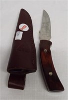 Buck No. 475 fixed blade knife with leather