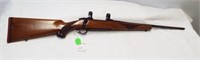 Ruger M77 7 x 57 bolt action rifle with scope