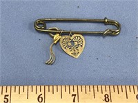 Unusual pin with small gold nugget like piece and
