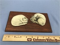 Pair of cast stone cats sleeping, mounted on wood
