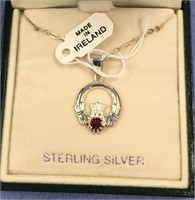 Sterling silver necklace with a rose colored stone