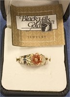 Ladies Black Hills gold ring with large flower in
