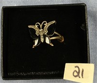 Silver toned ring with a butterfly
