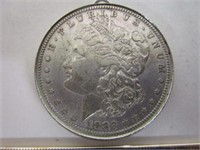 Coin; 1882 Morgan Silver Dollar; has been placed