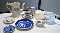 Porcelain pieces including blue willow pattern and