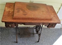 Antique Peddle Sewing Machine in Cabinet