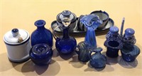 Assorted blue ceramic and glass items