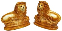 (2) STAFFORDSHIRE POTTERY RECLINED LION FIGURES