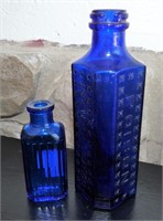 Cobalt Embossed "Poison" Bottles