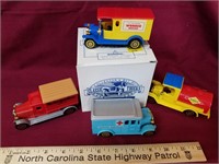 Lot of 4 plastic trucks