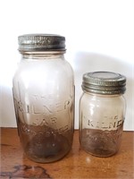 Vintage Kilner jars with glass top lids