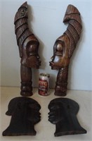 4 têtes africaines sculptées dans le bois