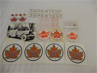 GROUPING OF SUPERTEST DECALS, BADGES & PRINT