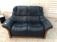 BLUE LEATHER TYPE RECLINING LOVESEAT