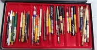 Advertising pens & pencils in display case