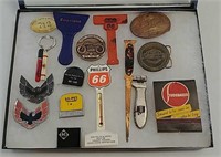 Misc auto memorabilia in display case