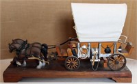 Conestoga Wagon with horses mounted on board