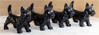 4 cast iron Scotty dogs, 7"l x 4.75"h