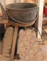 cast iron kettle on tripod, kettle is 24" diam &