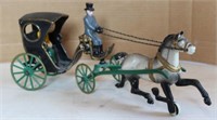 Cast iron horse & buggy with driver & passenger