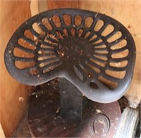 "Deering" cast iron implement seat on pedestal