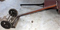 older wooden handle reel mower
