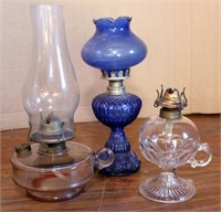 3 glass oil lights; blue one is 11.5" tall