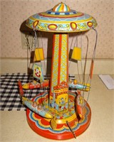 Ride A Rocket Tin Wind Up Carousel