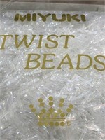 Miyuki 12 mm twisted bugle bead. Crystal two