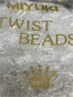 Miyuki 12 mm twisted bugle beads. Crystal color