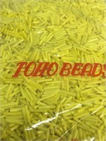 Toho 12 mm bugle beads, Opaque  yellow