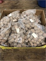 Box full of clay beads 25 per bag