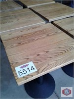 Table. Black pedestal base. Wood top. Approx. 26"