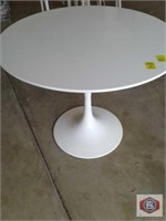 Table round 48". White with white round pedestal.