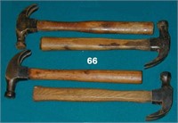 Four wooden handled 16-oz. claw hammers