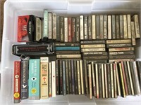 Container of CD’s, cassette tapes and books on