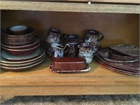 Set of brown Pottery.