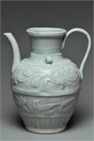 A SONG DYNASTY MOULDED QINGBAI EWER