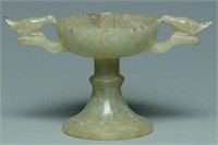 A HAN DYNASTY JADE LAMP STAND WITH BIRD HANDLES