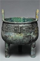 A SHANG DYNASTY BRONZE RITUAL FOOD VESSEL DING
