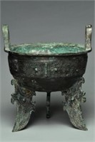A SHANG DYNASTY INSCRIBED BRONZE RITUAL DING