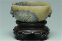 A HAN DYNASTY JADE ARCHAISTIC BOWL AND STAND