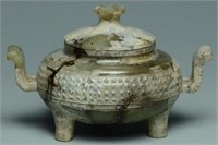 A CELADON JADE TRIPOD VESSEL AND COVER